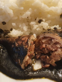 Una foto de Chipirones rellenos en su tinta