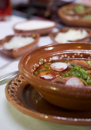 A picture of Pozole Itakatl with Guajillo Sauce.