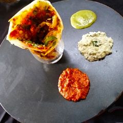 A picture of Cone Pizza Dosa.