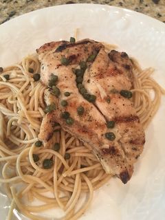 A picture of Lemon Chicken with Capers on Wheat Pasta.