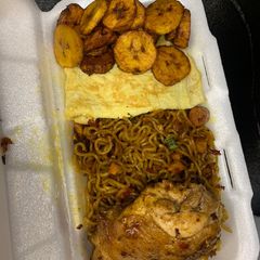A picture of Stir fry Noodles,omelette egg,plantain and chicken.