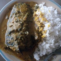 A picture of Boiled rice with ofe akwu.