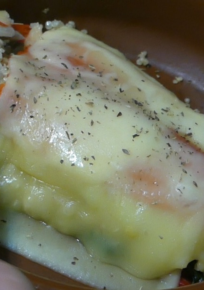 Una foto de Pimiento relleno de verduras y quinoa