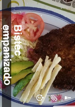 Una foto de Bistec empanizado