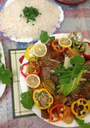 صورة لوصفة سمك محشي ومشوي مع الخضار 🎏 🐠