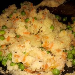 A picture of Upmaa carrot, green peas mix.