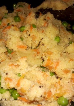 A picture of Upmaa carrot, green peas mix.