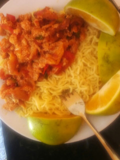 A picture of Fried eggs and indomie# marathon recipe.