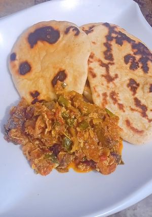 A picture of Pita bread with egg & liver sauce.