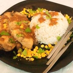 A picture of Chicken Steak with Corn.