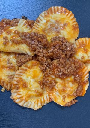 A picture of Meat Ravioli with Ragù.