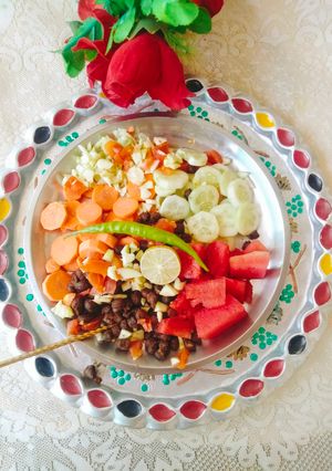 A picture of Kala chana with vegetable fruit chaat (Black chickpeas for protein packed Breakfast).
