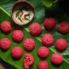 A picture of Beetroot and Walnut Paniyarams.