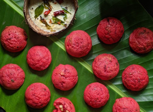 A picture of Beetroot and Walnut Paniyarams.