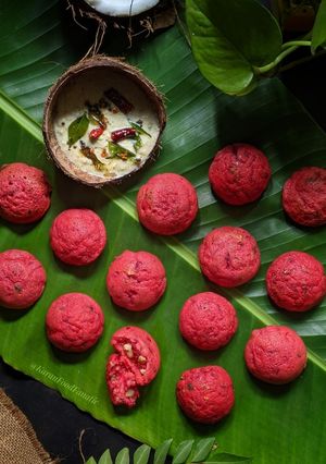 A picture of Beetroot and Walnut Paniyarams.