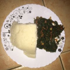 A picture of Pumpkin leaves + spinach served with ugali.