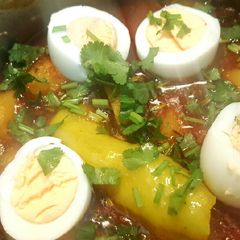 Boiled egg and Potato curry with green chilli and coriander 😋 A picture of Boiled egg and Potato curry with green chilli and coriander 😋.