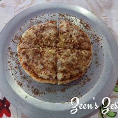 A picture of Za'atar loaded Cheese Pizza.