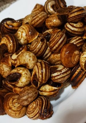 Una foto de Caracoles fritos al ron