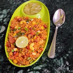 A picture of Veggie Masala Poha/Flattered Rice.