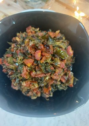 A picture of Fenugreek leaves with carrot 🥕.