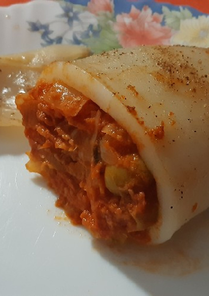 Una foto de Calamar relleno con sobras de salsa para espaguetis