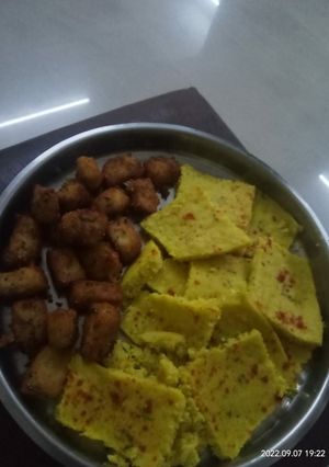 A picture of Dhokla and cheese potato bites.