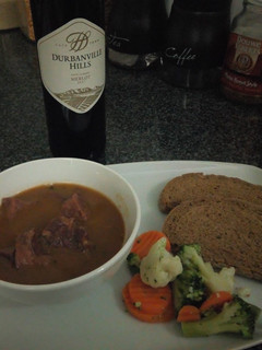 A picture of Dad's Ox Tongue, Steamed Veggies and Rye Bread.