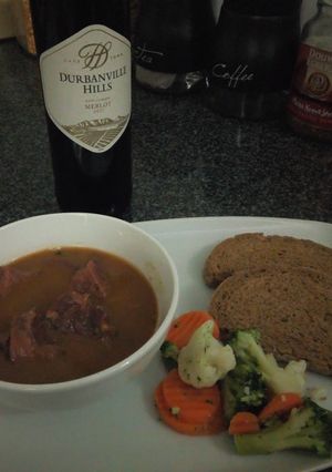 A picture of Dad's Ox Tongue, Steamed Veggies and Rye Bread.