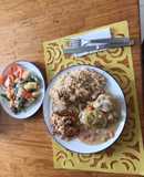 Muslo de pollo en salsa de naranja