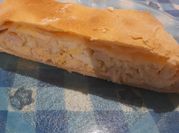 Una foto de calzone de pollo y verdura