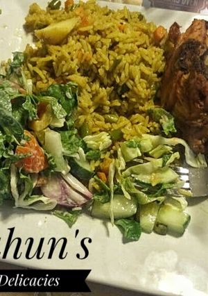A picture of Fried Rice with Salad.