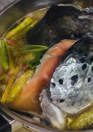 A picture of Salmon & Kang Kong in Tamarind Broth : Filipino Fish Sinigang > Savoury Sour Soup vs Tom Yum.