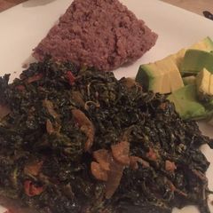 A picture of Kunde with brown ugali.