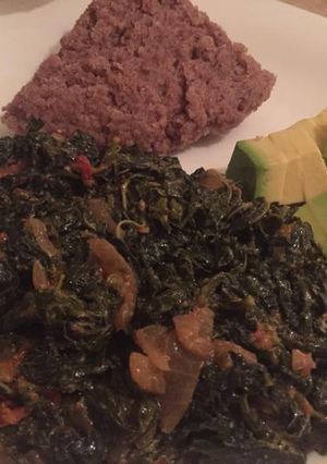 A picture of Kunde with brown ugali.