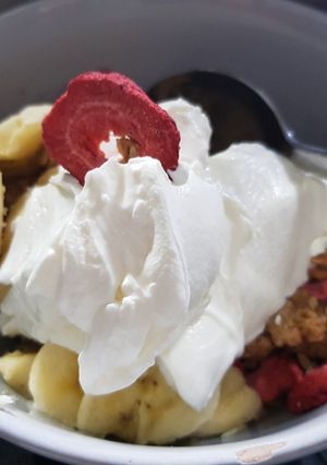 A picture of My Breakfast today. Granola with strawberries + & fresh Banana.