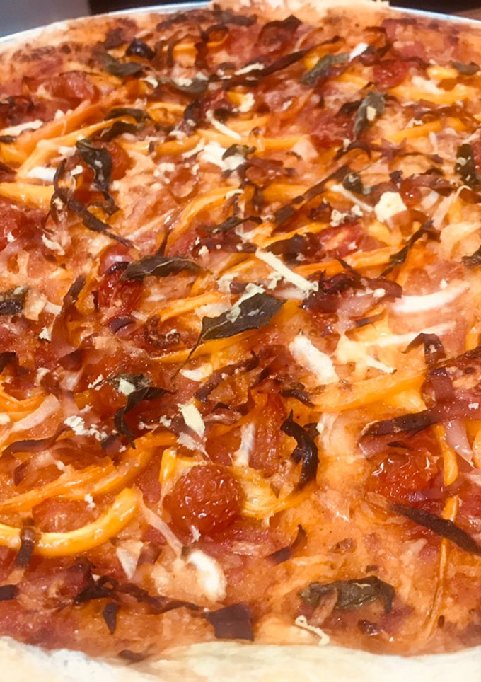 Una foto de Pizza vegetariana