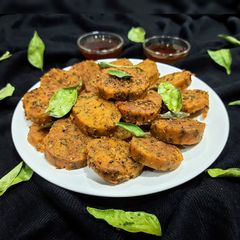 A picture of Steamed Corn Methi Muthia.