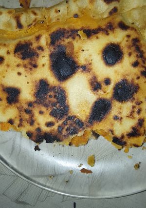 صورة لوصفة كسرة محشية بالبصل وشحمة خروف