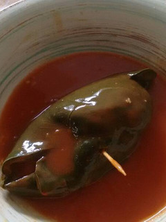Una foto de Chiles poblanos en salsa. ॐ