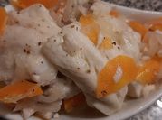 Una foto de pescado en escabeche