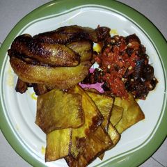 A picture of Fried Yam with Fried Plantain and Peppered Fried Kpomo.
