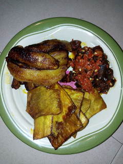 A picture of Fried Yam with Fried Plantain and Peppered Fried Kpomo.