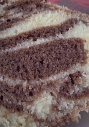 Una foto de Pastel marmolado naranja/ chocolate