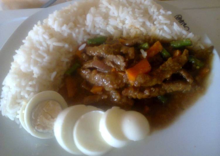 White Rice and Stripped Beef Sauce