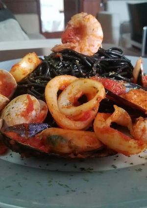 Una foto de Frutti di mare con spaghetti Nero