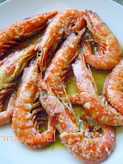 Una foto de Gambas al horno en salsa verde