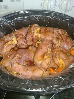 A picture of Honey garlic chicken in slow cooker.