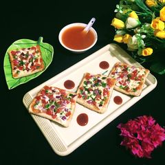 A picture of Vegetable Cheese Toast.