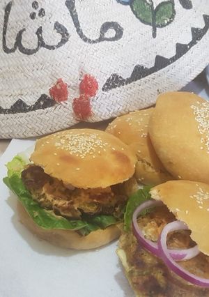 A picture of Home made veggie and meat burgers.